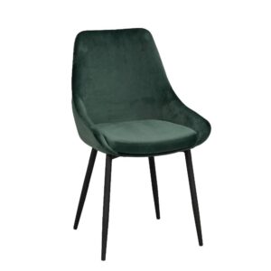 Sierra stol från Rowico har svarta metallben. Här är stolen klädd i grönt sammetstyg.